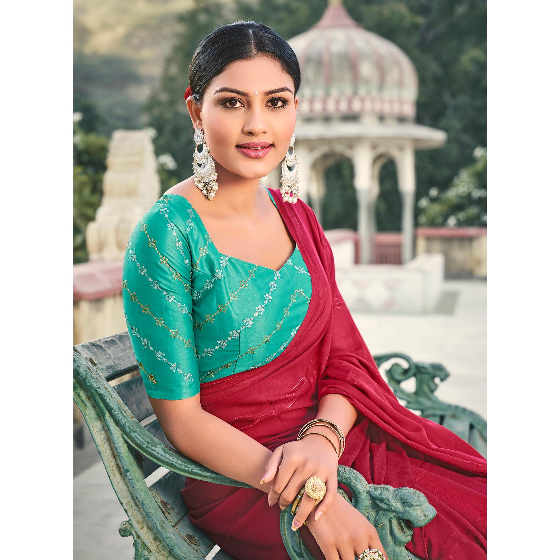 Dark Pink Printed Georgette Saree With Tassels