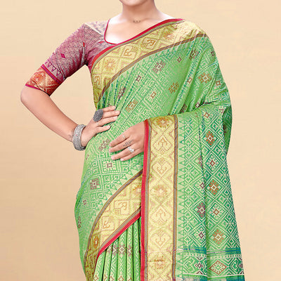 green-woven-patola-art-silk-saree-with-tassels-2
