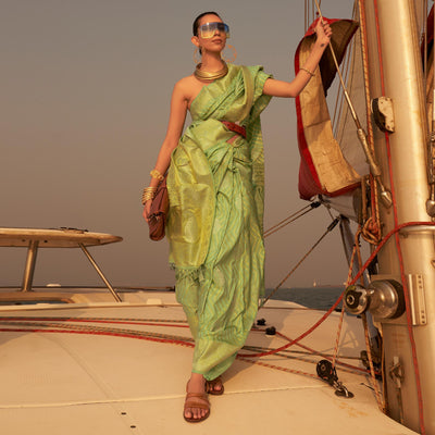 Mint Green Woven Satin Saree With Tassels