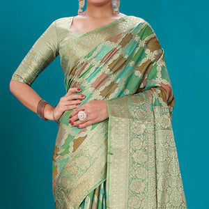 green-woven-organza-saree-with-tassels-16