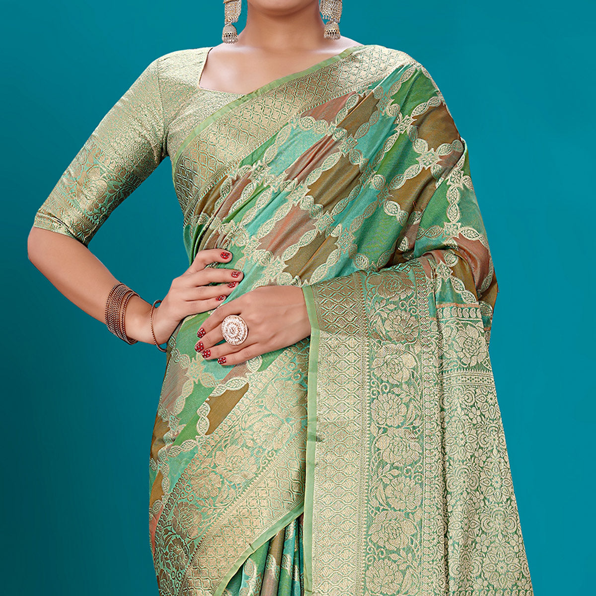 green-woven-organza-saree-with-tassels-16