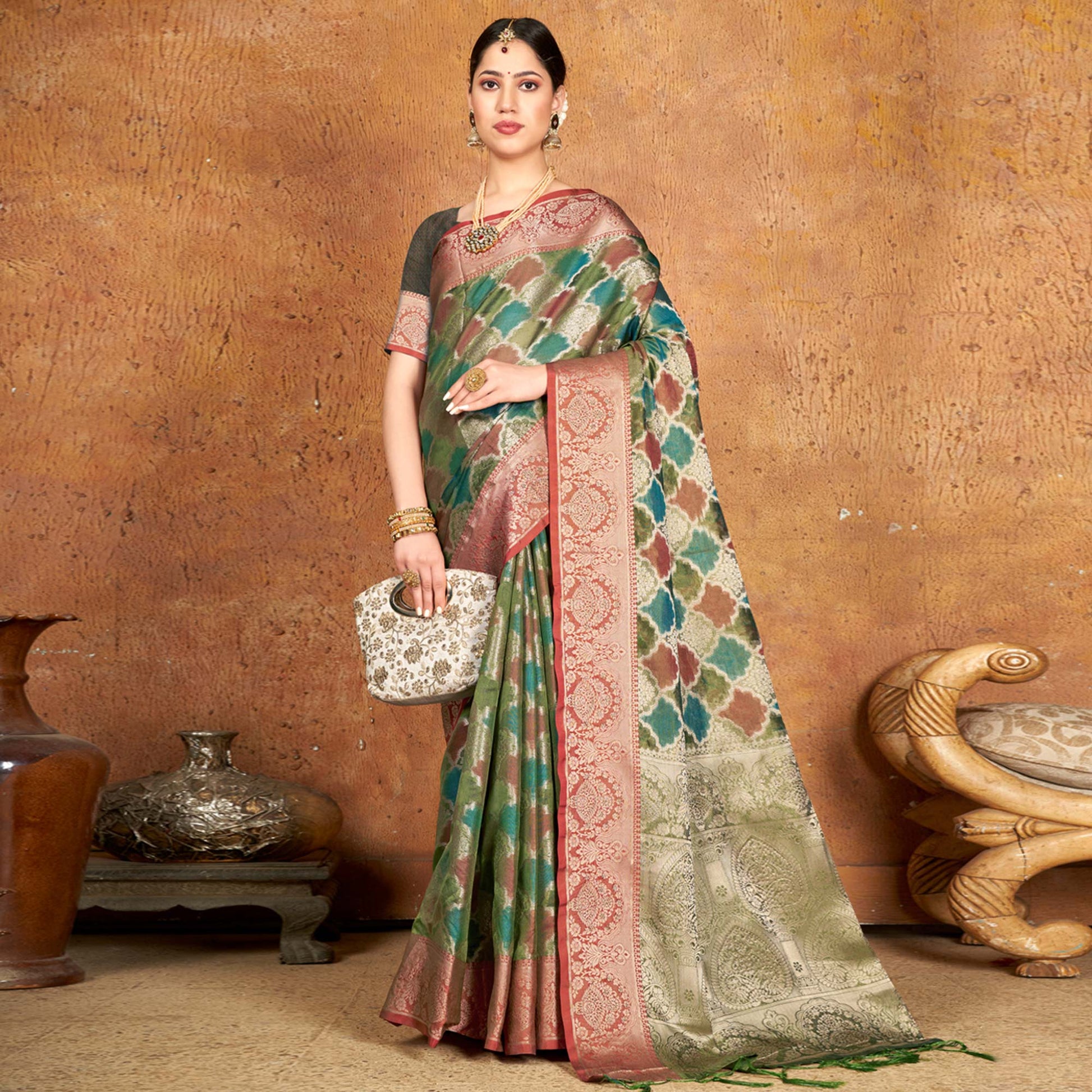 green-woven-organza-saree-with-tassels-7