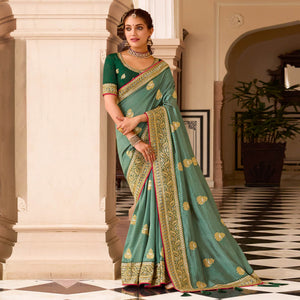 1-green-embroidered-vichitra-silk-saree-with-with-tassels