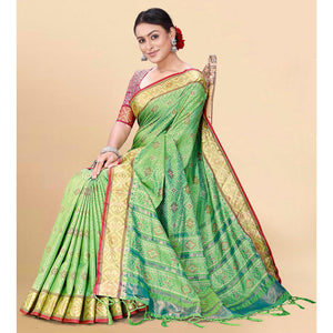 green-woven-patola-art-silk-saree-with-tassels-2