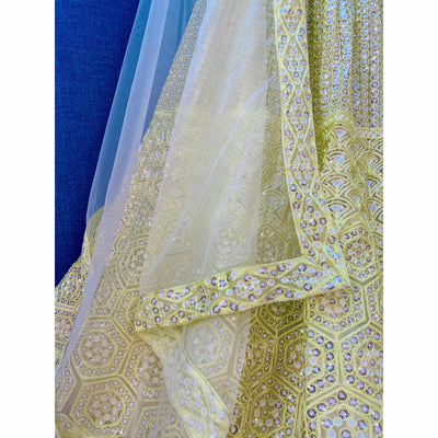 Lemon Yellow Sequins Embroidered Netted Lehenga Choli
