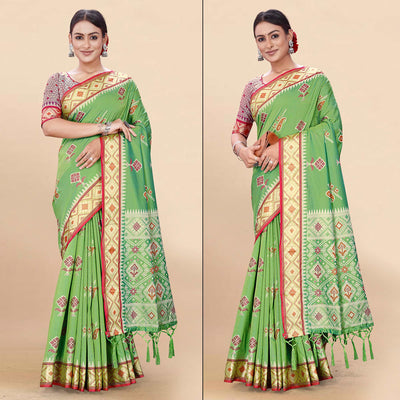 green-woven-patola-art-silk-saree-with-tassels-1