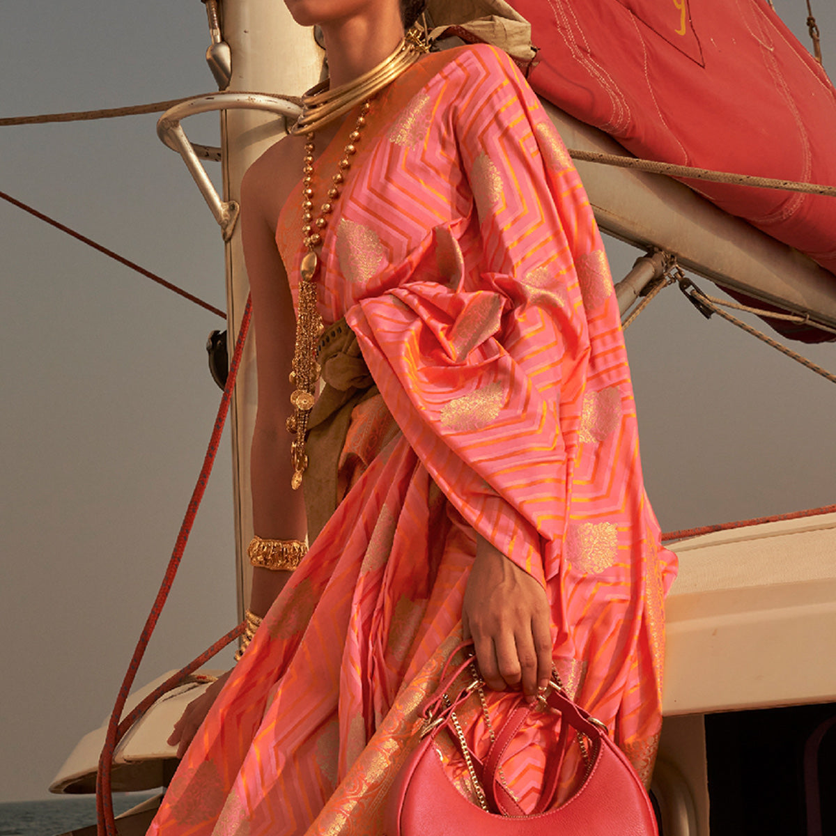 Coral Woven Satin Saree With Tassels