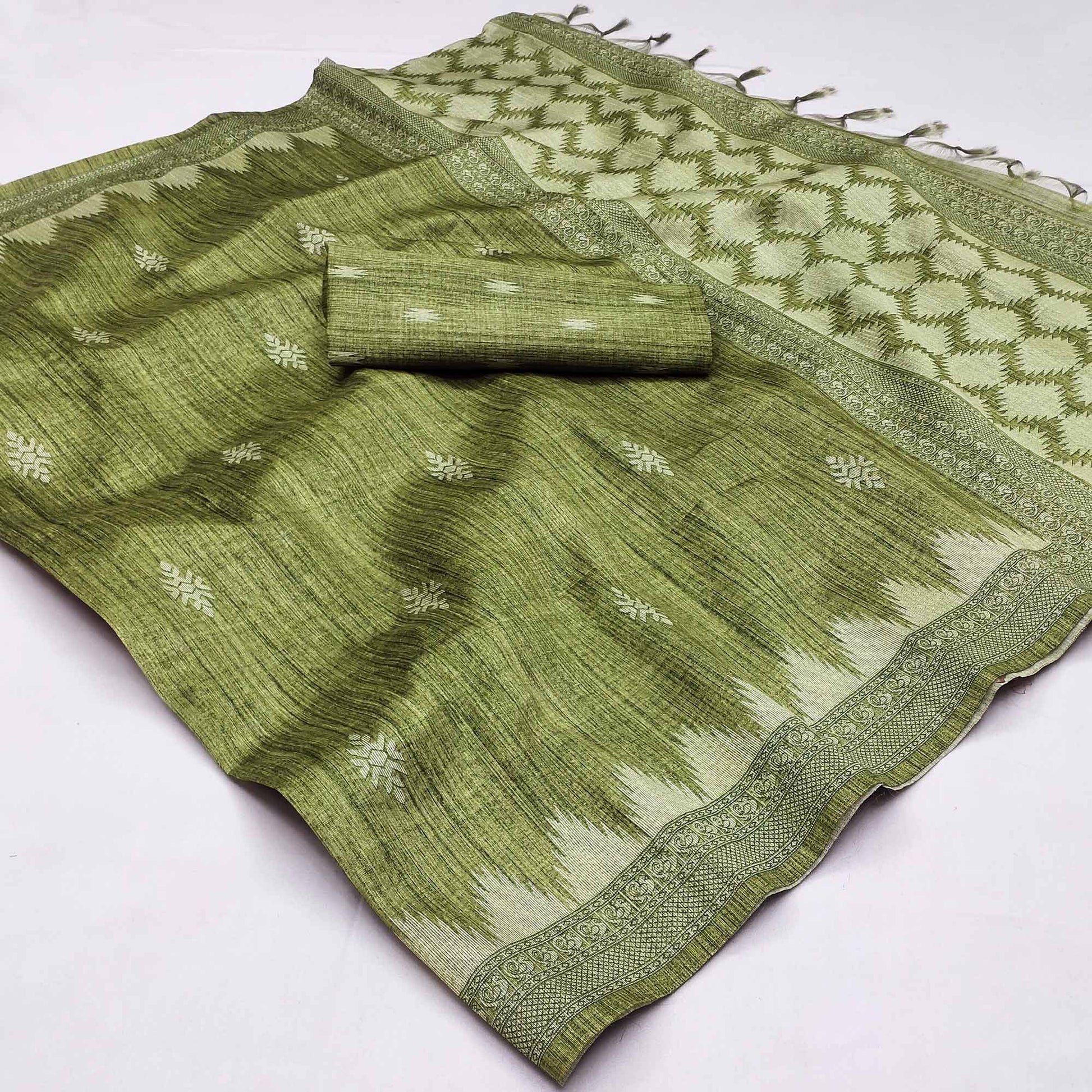 green-printed-tussar-silk-saree-with-tassels