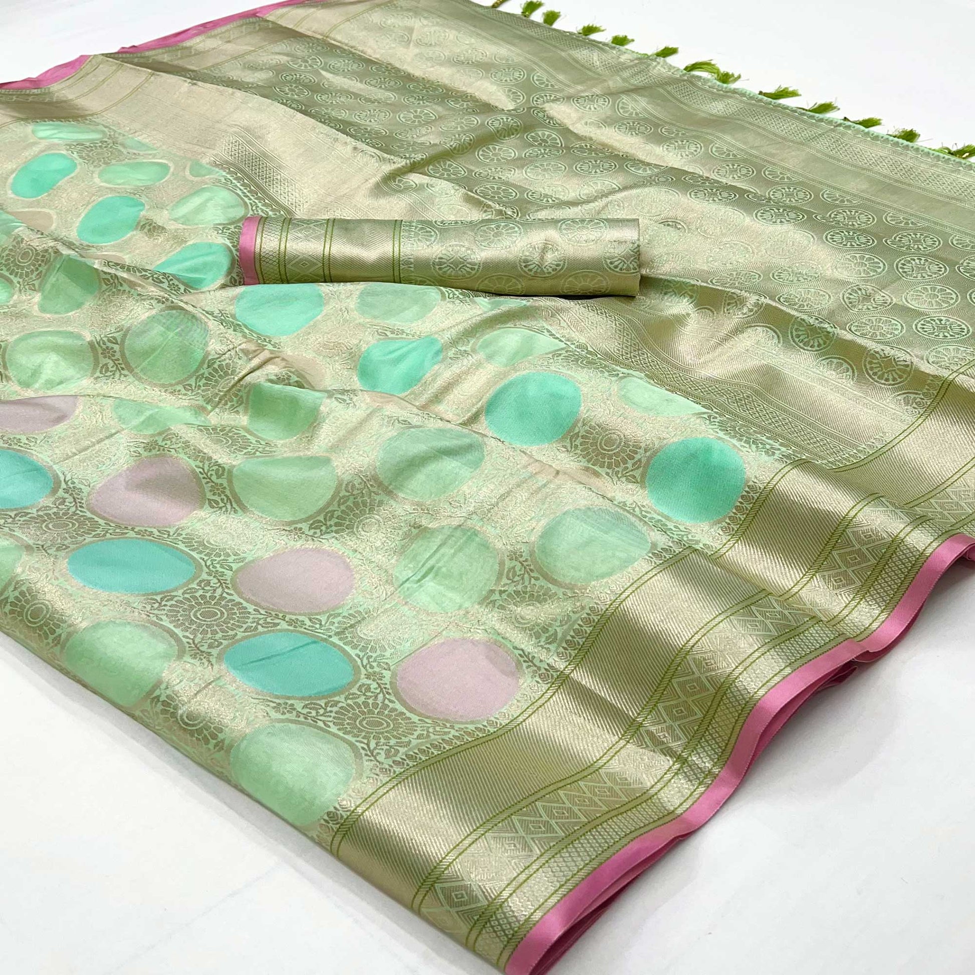 green-floral-woven-organza-saree-with-tassels