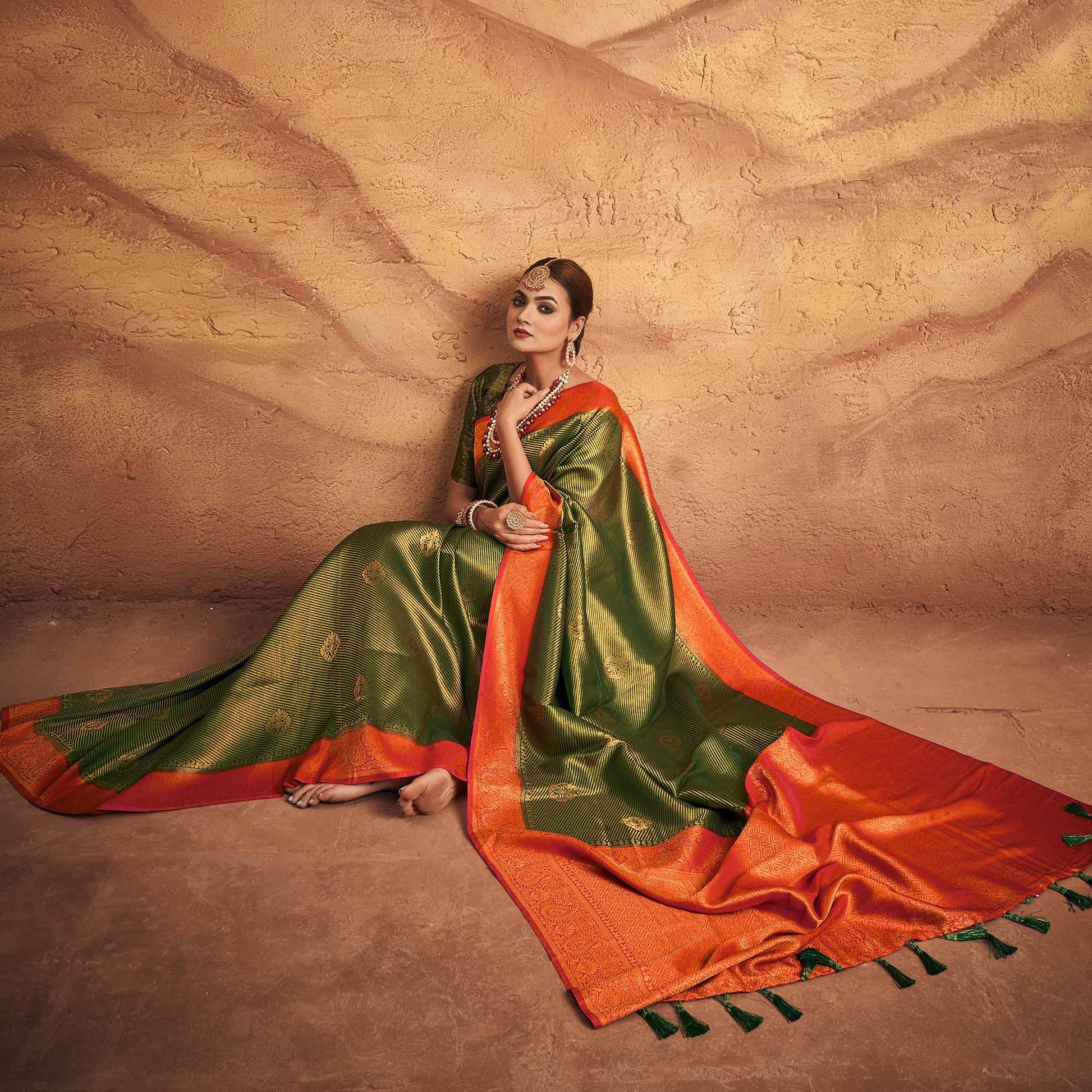green-woven-art-silk-saree-with-tassels-1