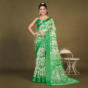 green-floral-printed-jute-saree-with-tassels-1