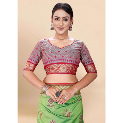 green-woven-patola-art-silk-saree-with-tassels-1