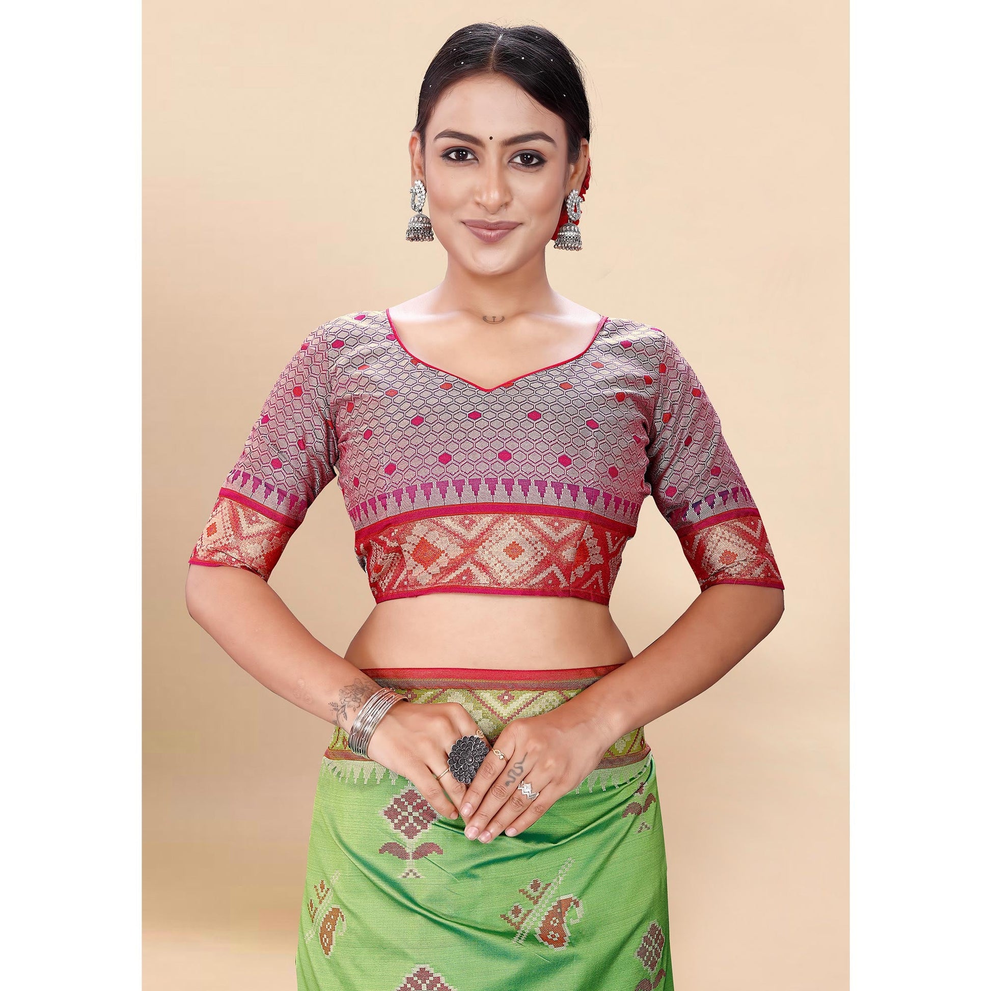 green-woven-patola-art-silk-saree-with-tassels-1