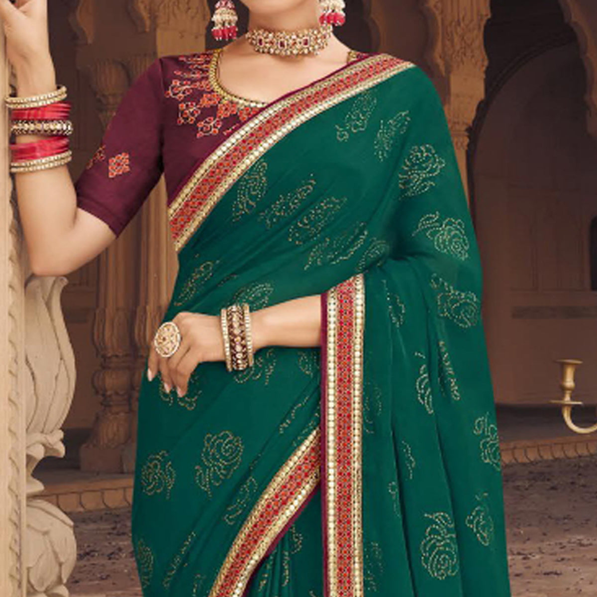 green-embellished-with-embroidered-border-satin-saree