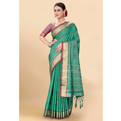 green-woven-patola-art-silk-saree-with-tassels-3