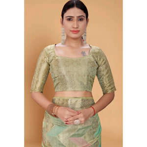 green-woven-organza-saree-with-tassels-12