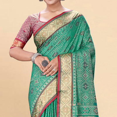 green-woven-patola-art-silk-saree-with-tassels-3