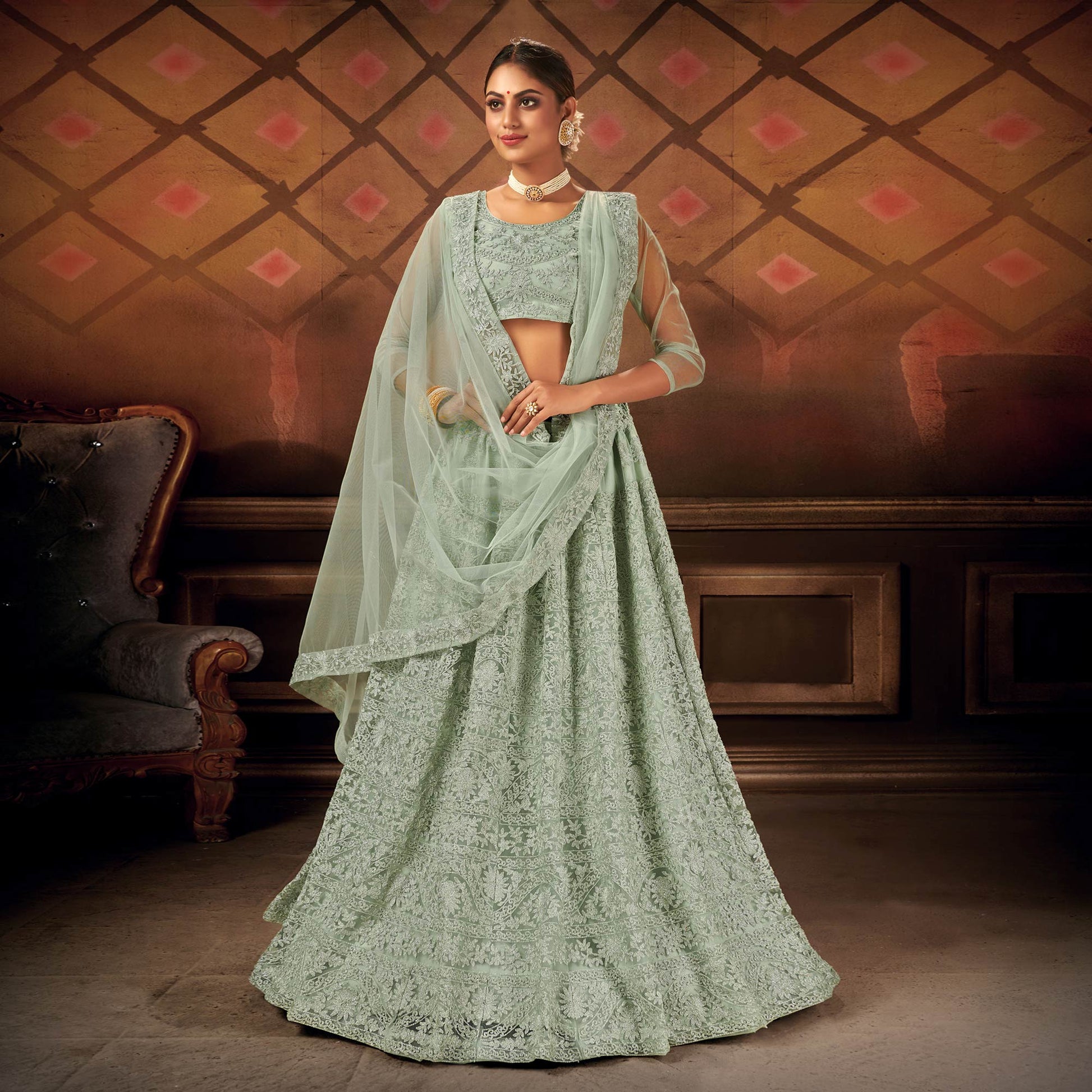 green-embroidered-netted-lehenga-choli