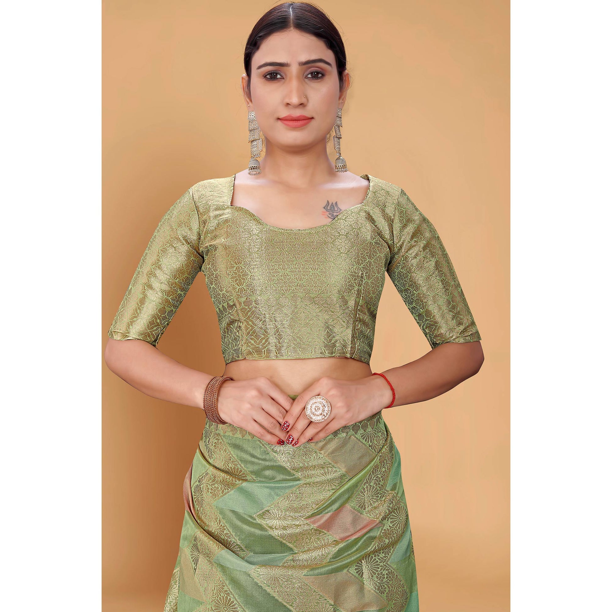 green-woven-organza-saree-with-tassels-13