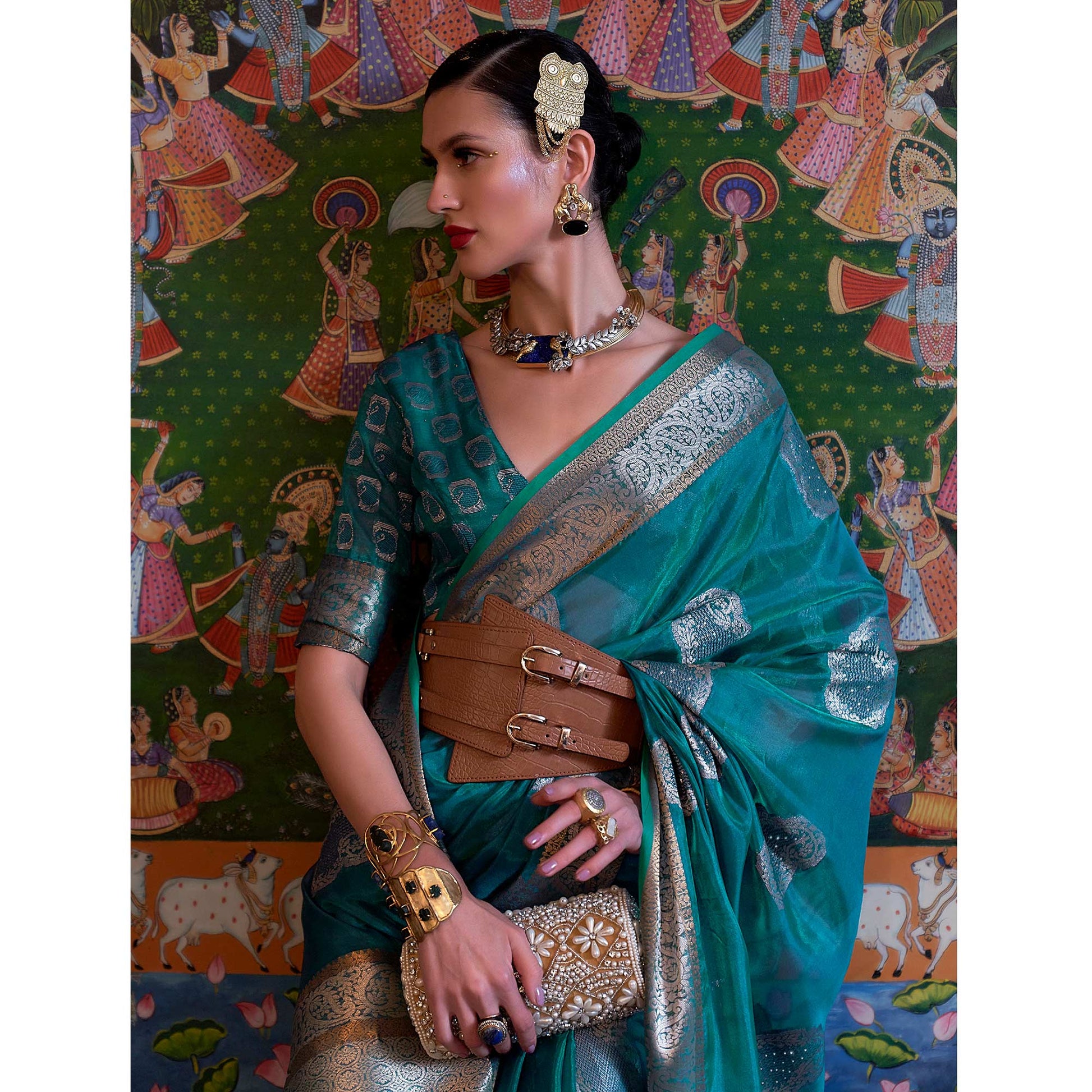 Blue Woven Organza Saree With Tassels