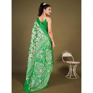 green-floral-printed-jute-saree-with-tassels-1