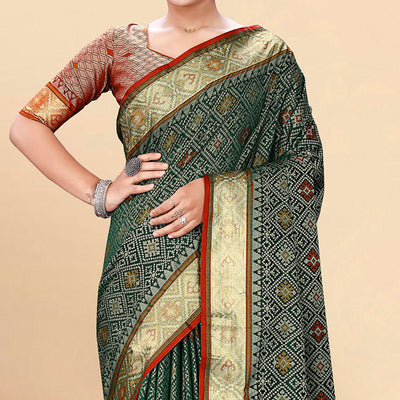 green-woven-patola-art-silk-saree-with-tassels-4