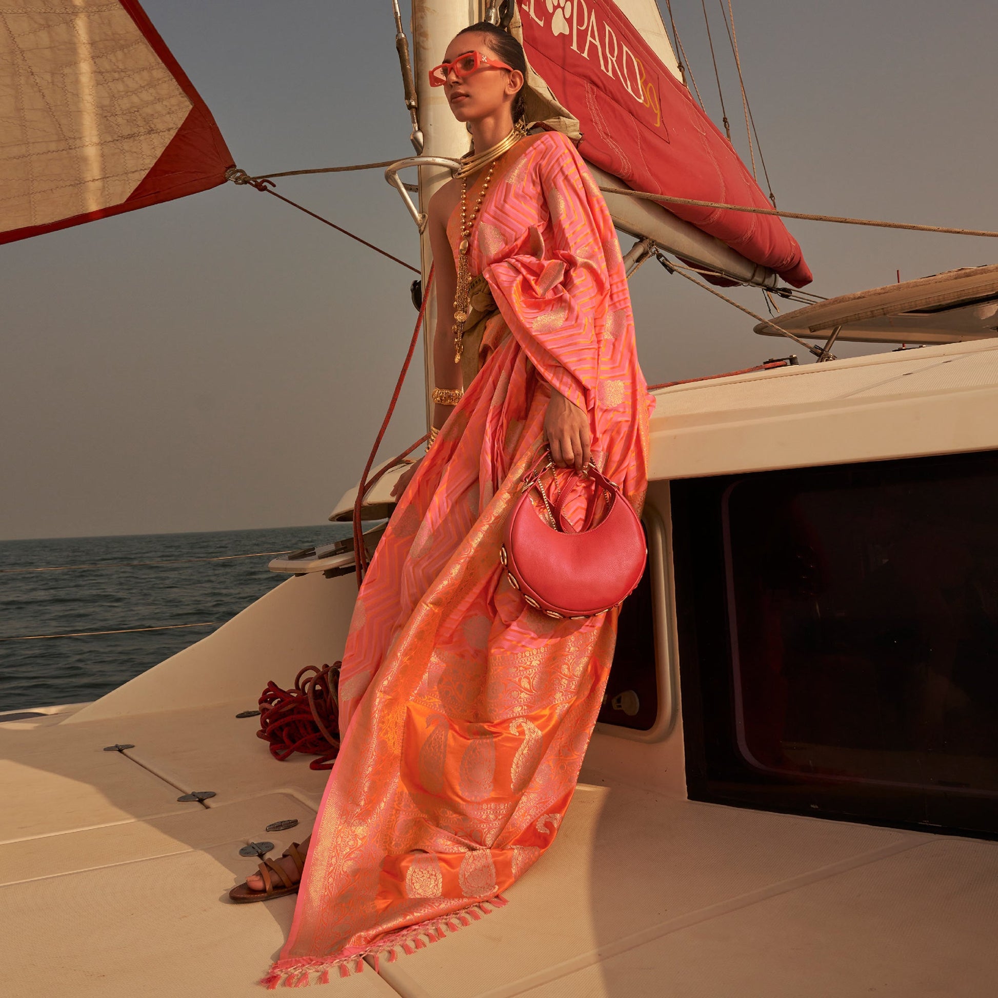 Coral Woven Satin Saree With Tassels