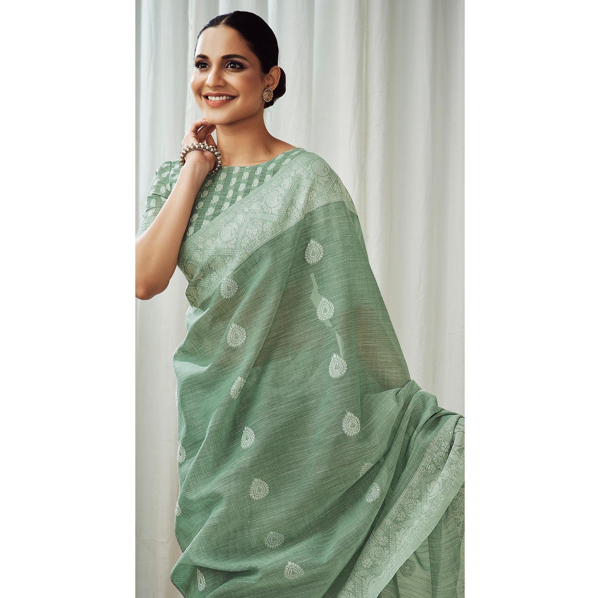 green-woven-linen-saree-2