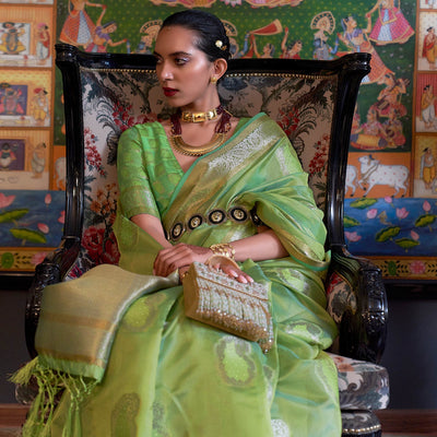 1-green-woven-organza-saree-with-tassels