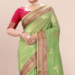 green-woven-organza-saree-with-tassels-10