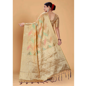 Chikoo Woven Organza Saree With Tassels