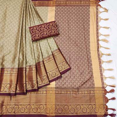 Chikoo Printed And Woven Cotton Silk Saree With Tassels