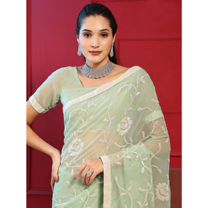 green-sequins-embroidered-georgette-saree-1