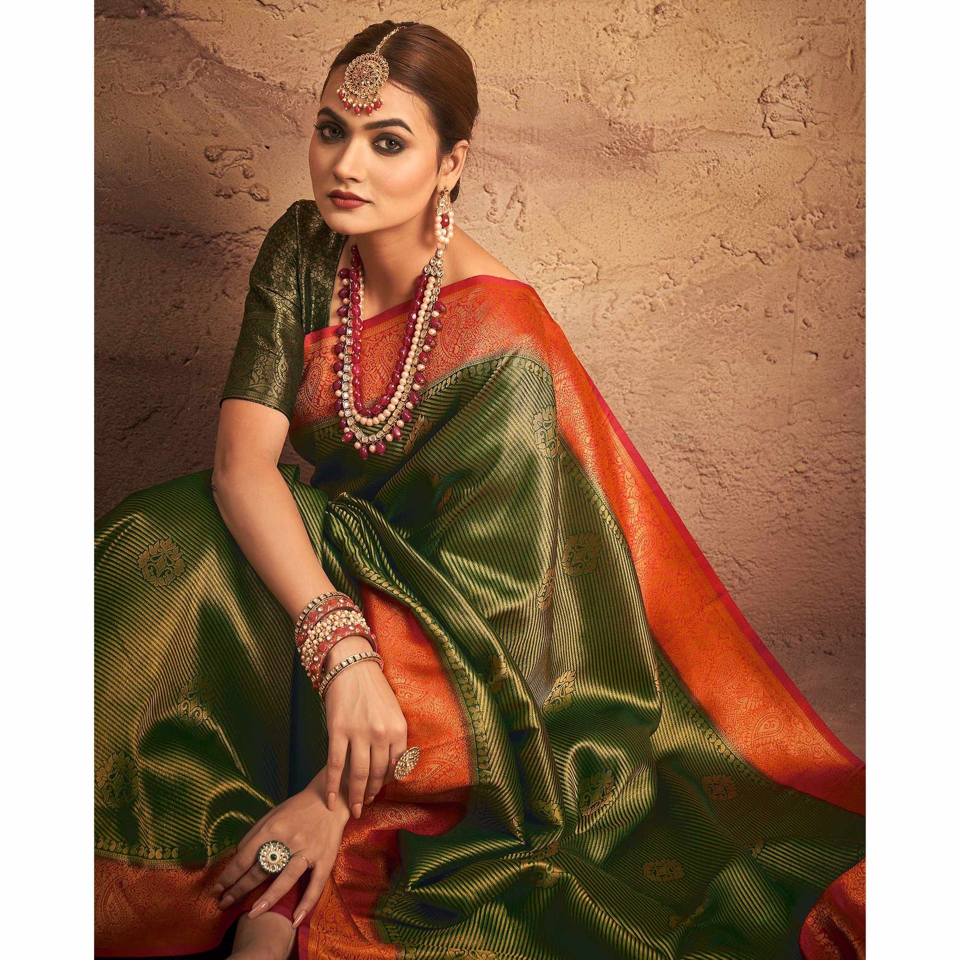 green-woven-art-silk-saree-with-tassels-1