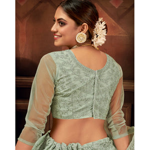 green-embroidered-netted-lehenga-choli