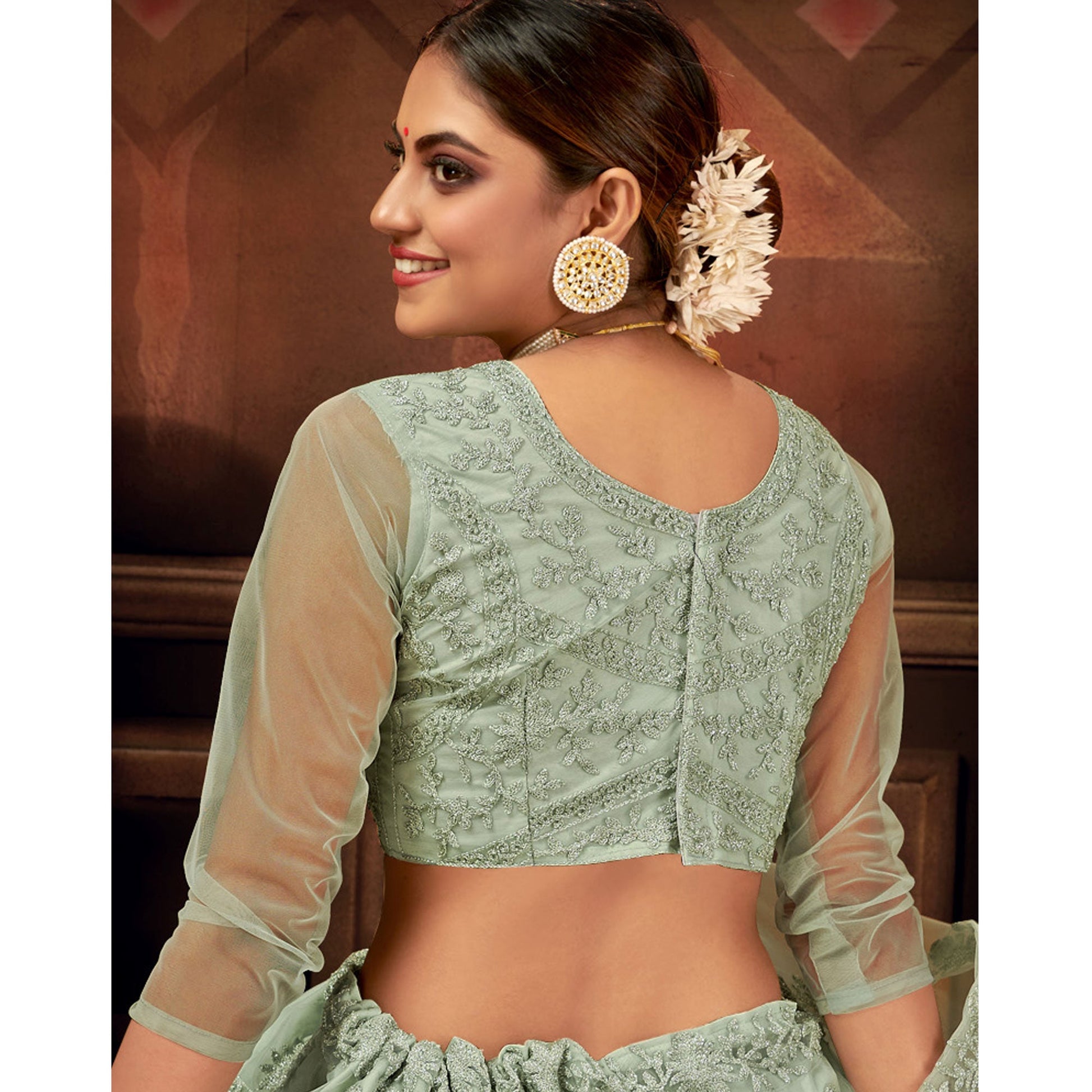 green-embroidered-netted-lehenga-choli
