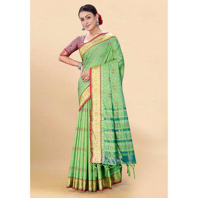 green-woven-patola-art-silk-saree-with-tassels-2