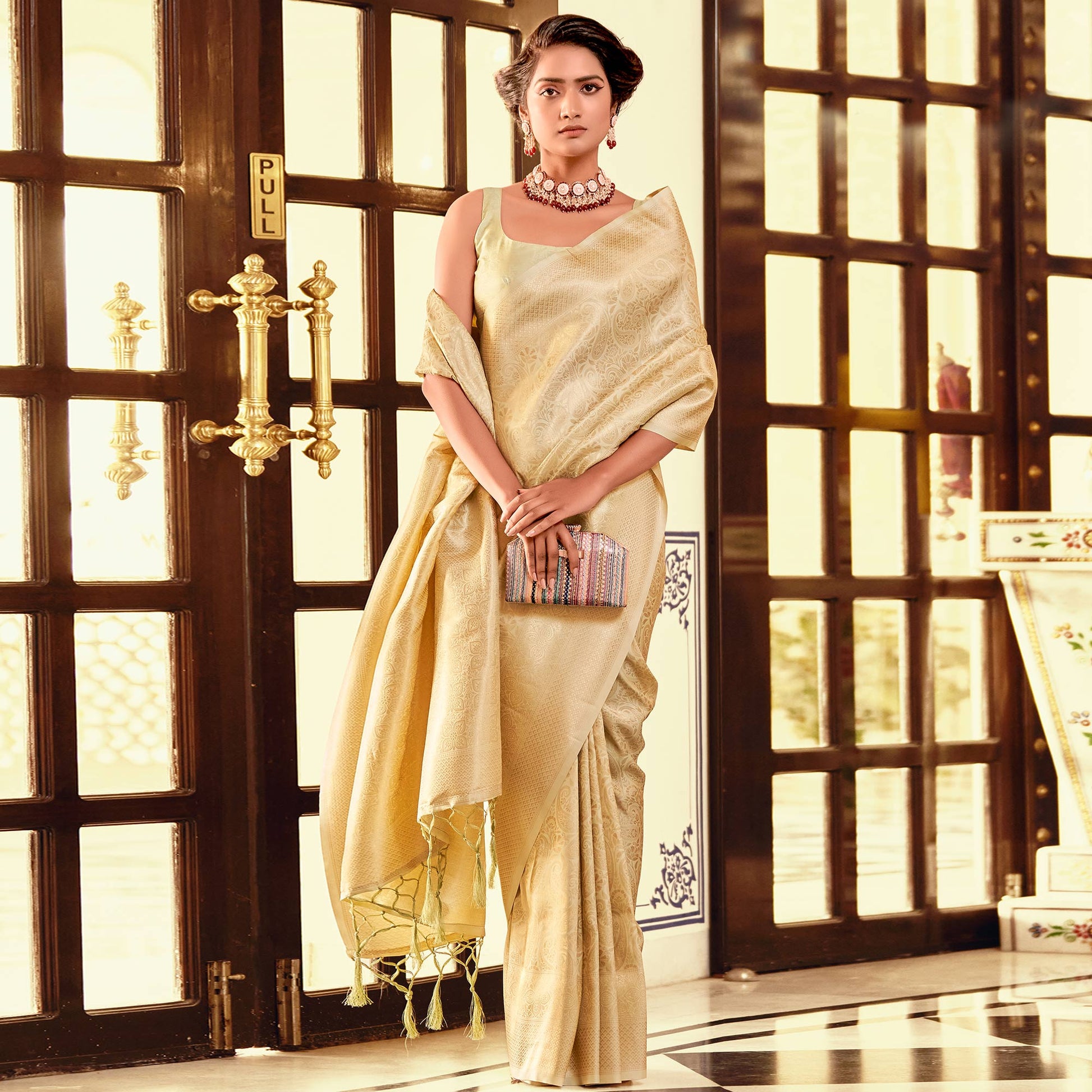 Light Yellow Woven Kanjivaran Silk Saree