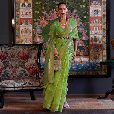 1-green-woven-organza-saree-with-tassels