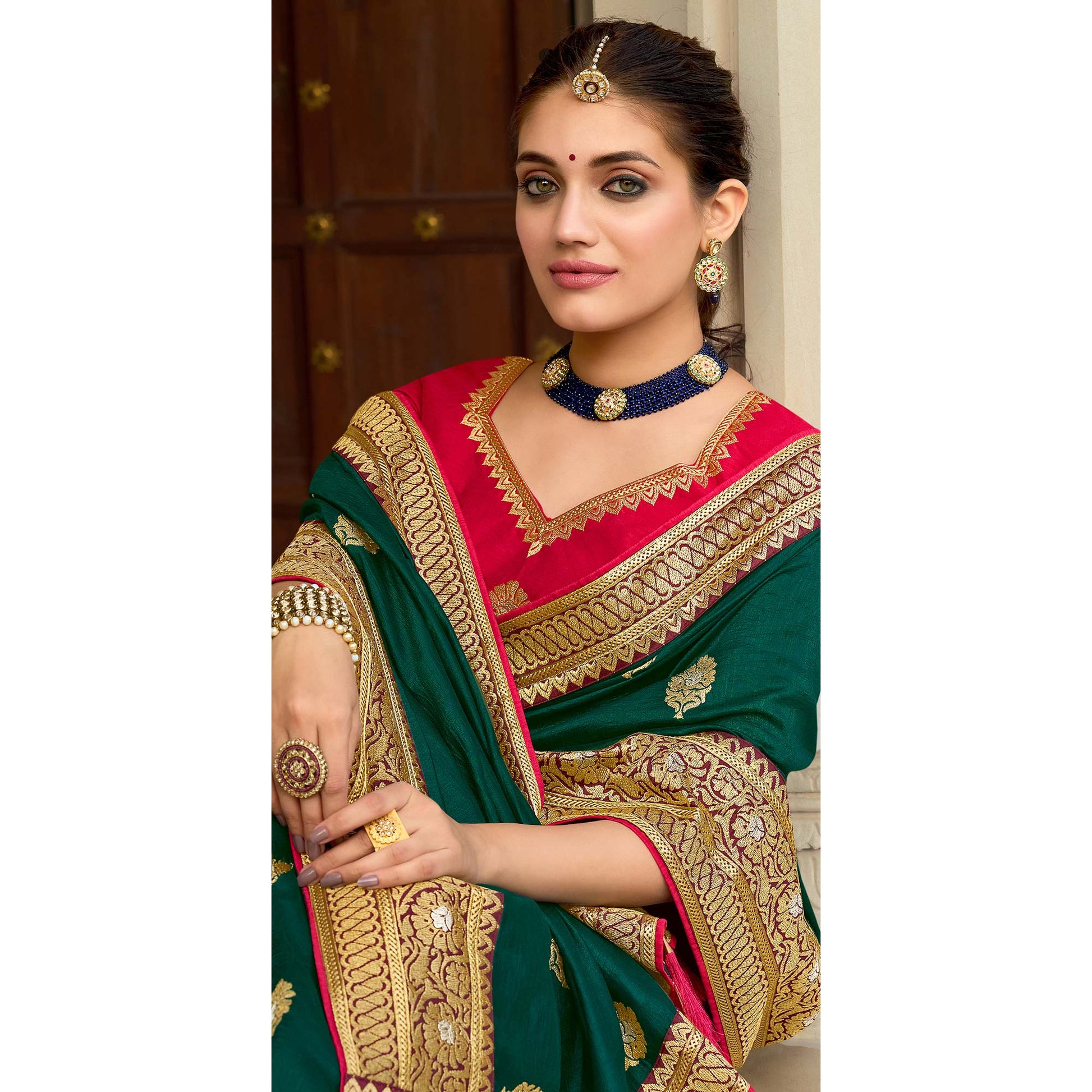green-embroidered-vichitra-silk-saree-with-with-tassels