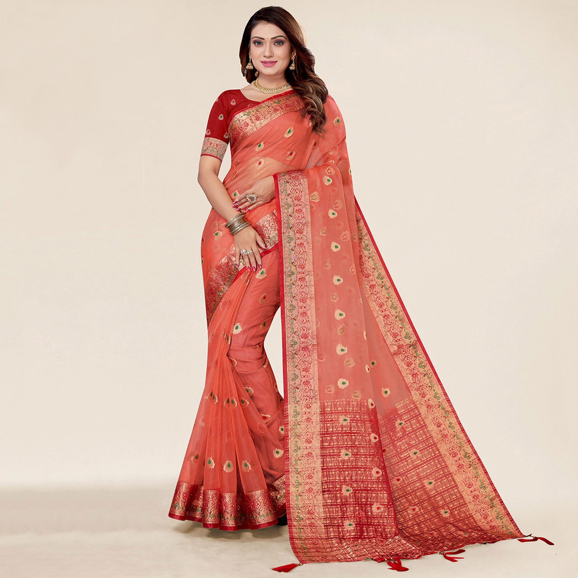 Gajari Pink Woven Organza Saree With Tassels