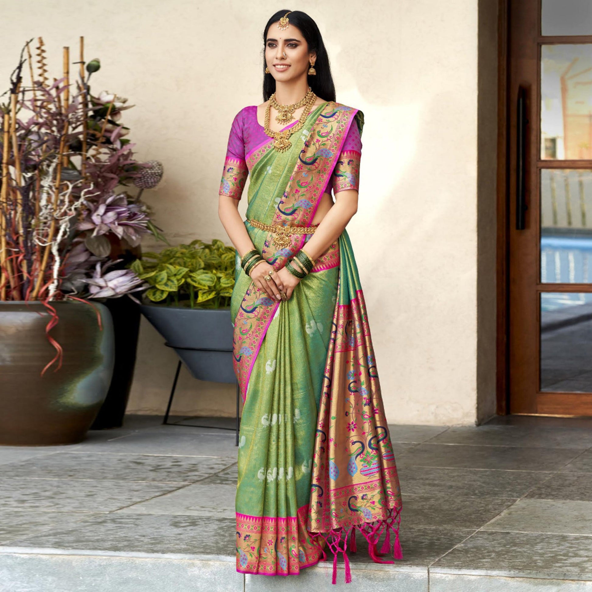 green-woven-kanjivaram-silk-paithani-saree-with-tassels