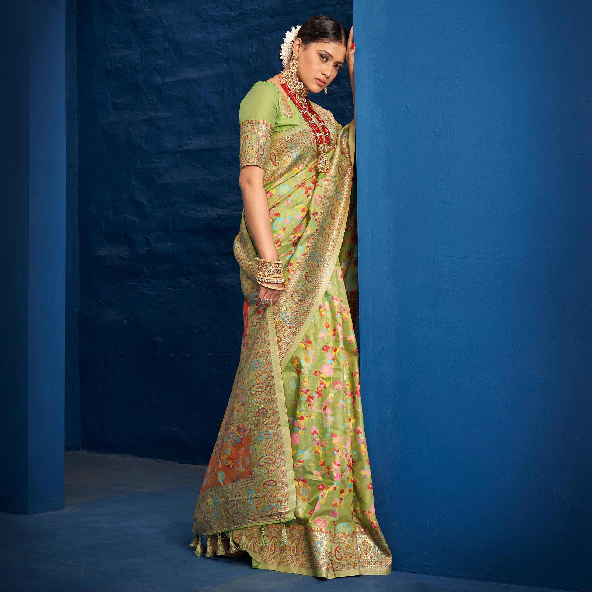 green-woven-art-silk-saree-with-tassels-10
