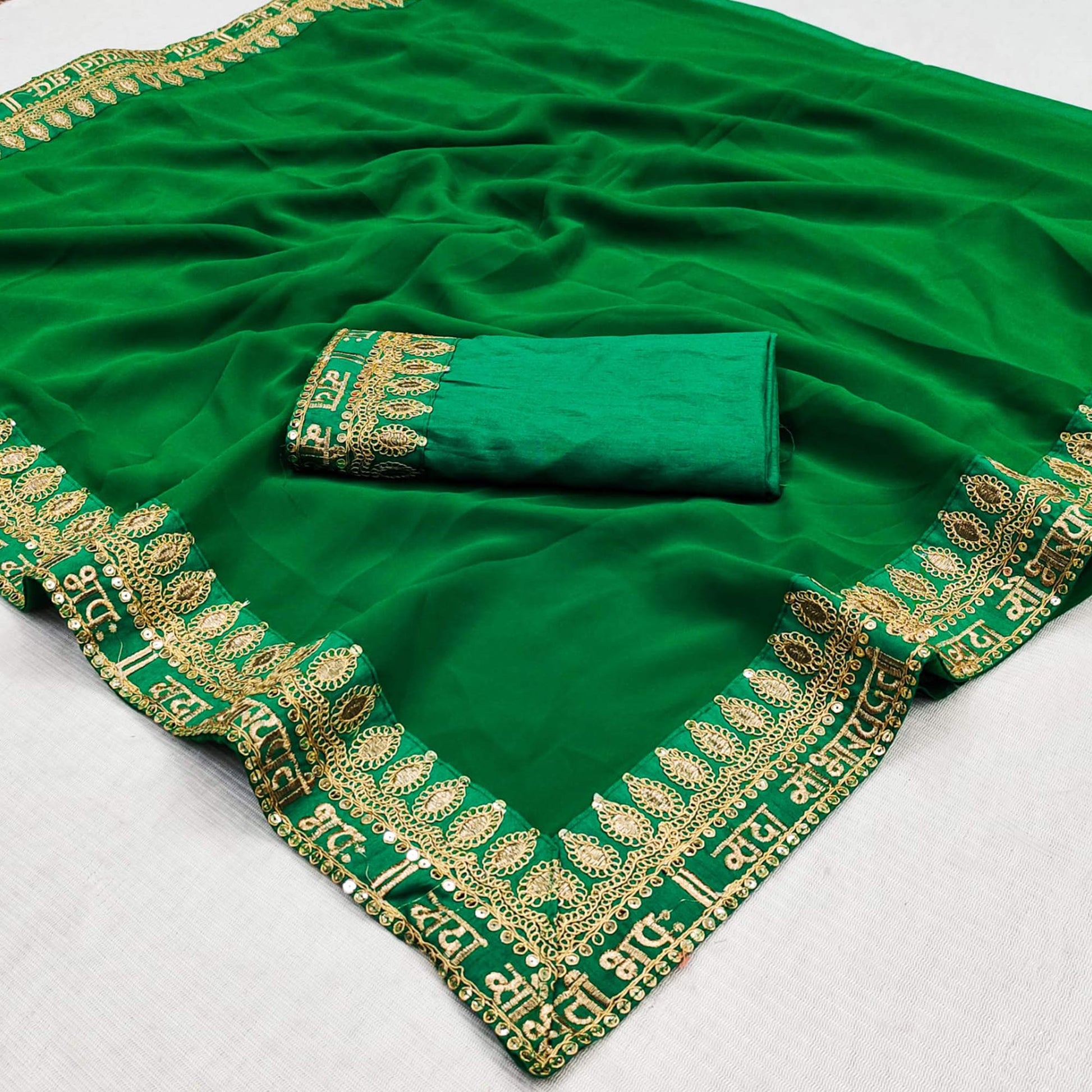 green-embroidered-border-georgette-saree
