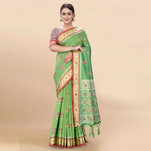 green-woven-patola-art-silk-saree-with-tassels-1