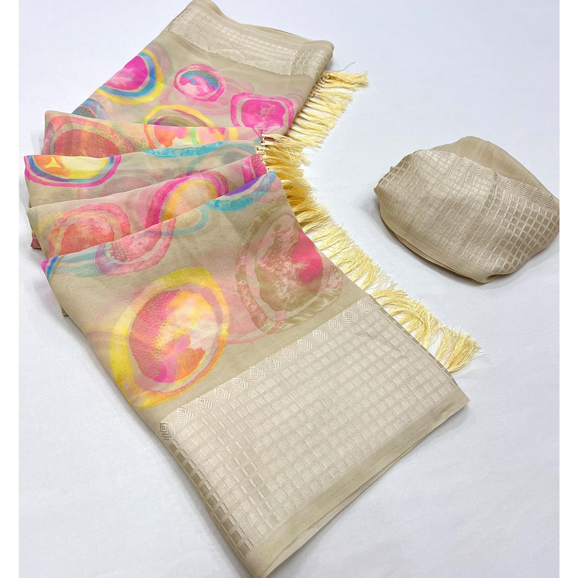 Chikoo Printed Georgette Saree With Tassels