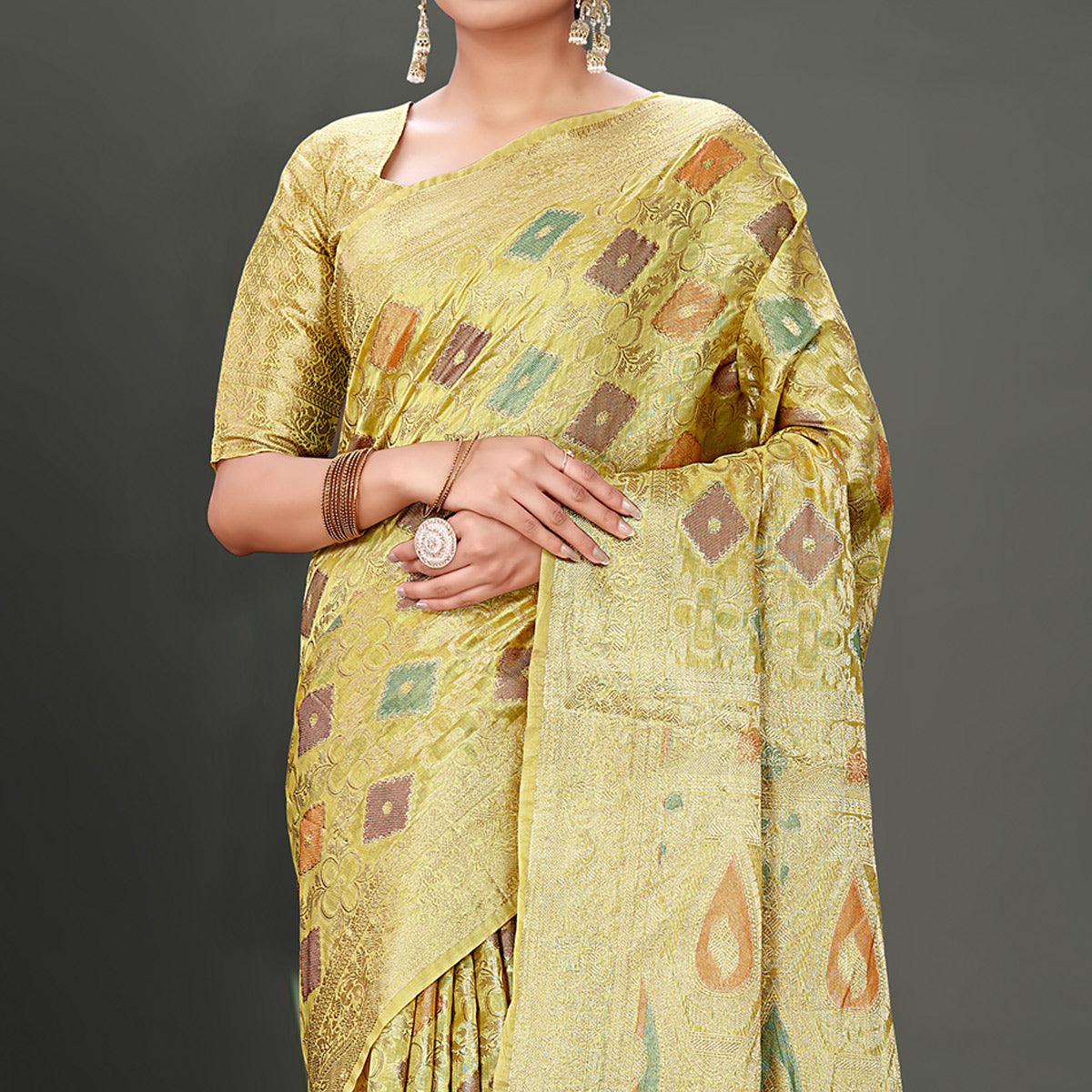 Lemon Green Woven Organza Saree With Tassels