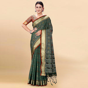 green-woven-patola-art-silk-saree-with-tassels-4