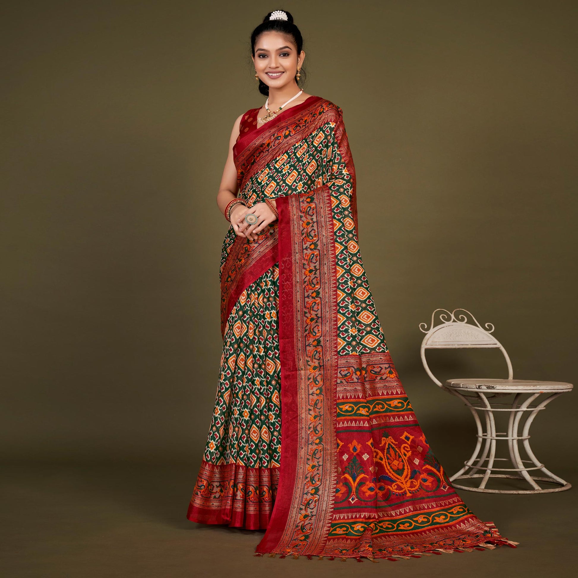 green-printed-jute-patola-saree-with-tassels-1