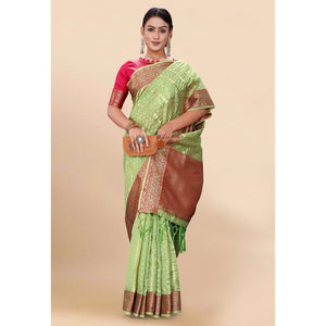 green-woven-organza-saree-with-tassels-19